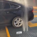 A car wash that looks more like a storm than a service bay