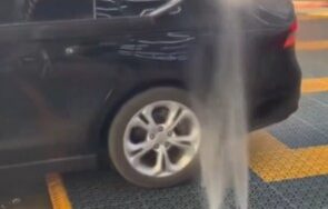 A car wash that looks more like a storm than a service bay
