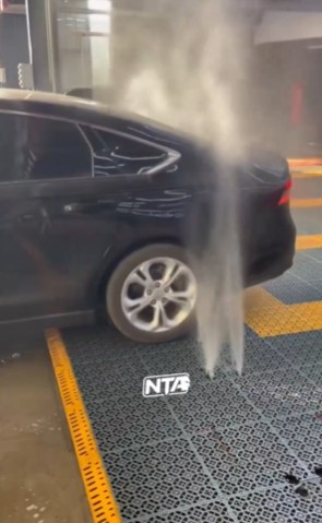 A car wash that looks more like a storm than a service bay