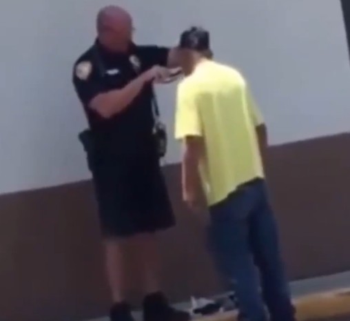 A Police Officer Helps a Homeless Man Get Ready for a Job Interview. The Scene Is Heartbreaking.